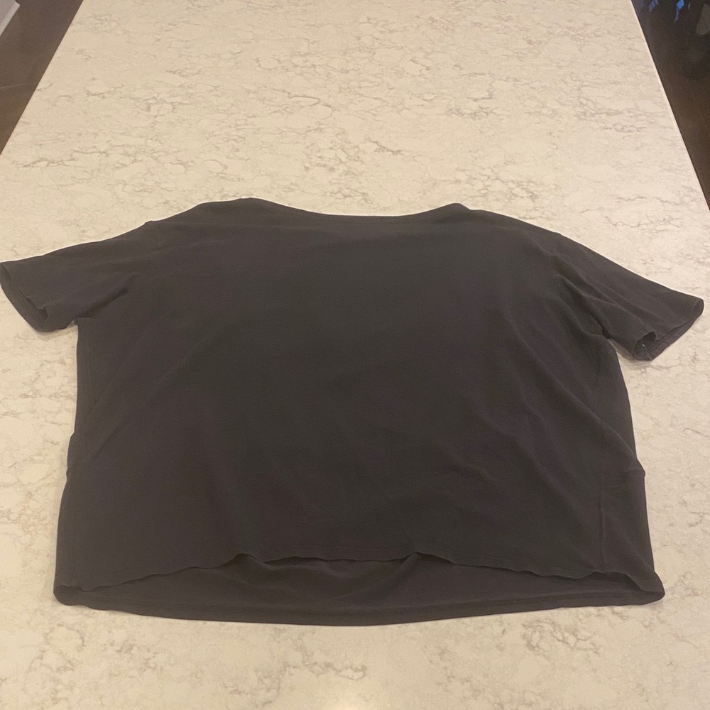 Lululemon black back in action top, size 6, medium